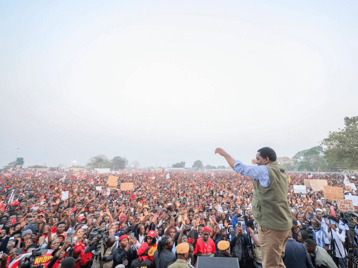 President Hakainde Hichilema addresses a large crowd of UPND supporters at a campaign rally