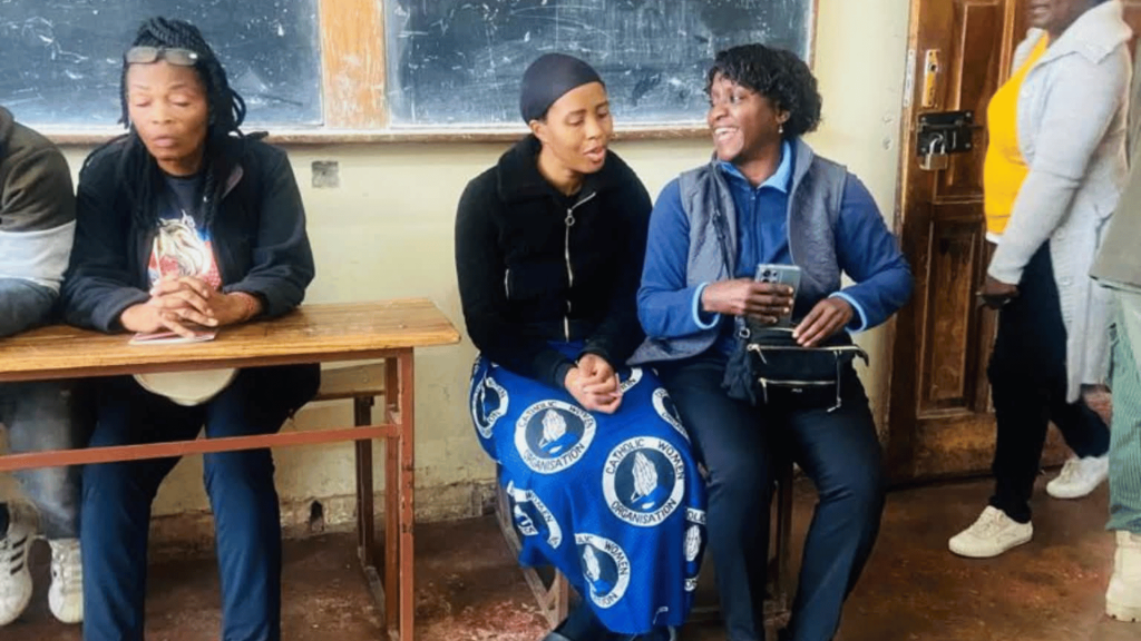 Tasila Lungu Mwansa with husband Patrick Mwansa and Lusaka Central candidate Charity Lumpa at Kabulonga Boys polling station