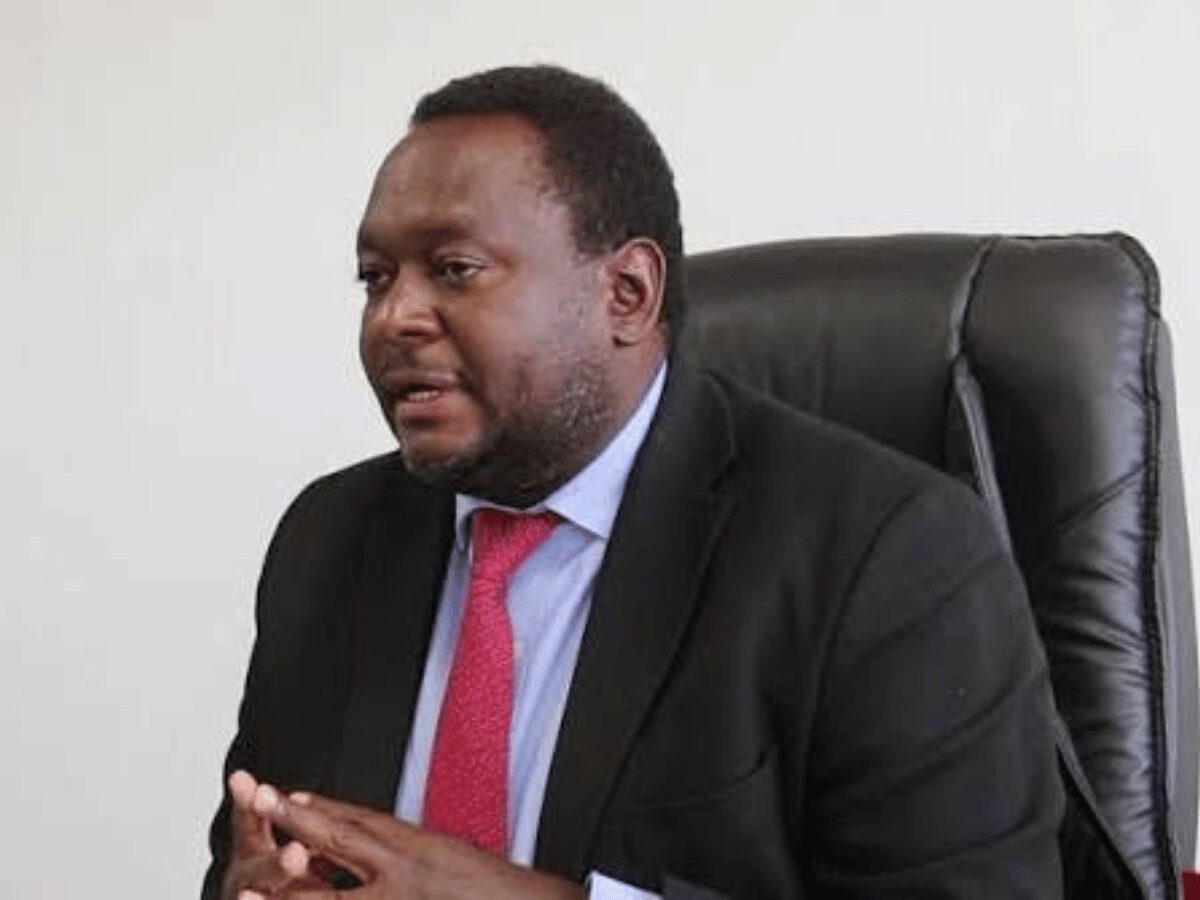 Dr Namani Monze, Southern Province Permanent Secretary, seated at his office desk
