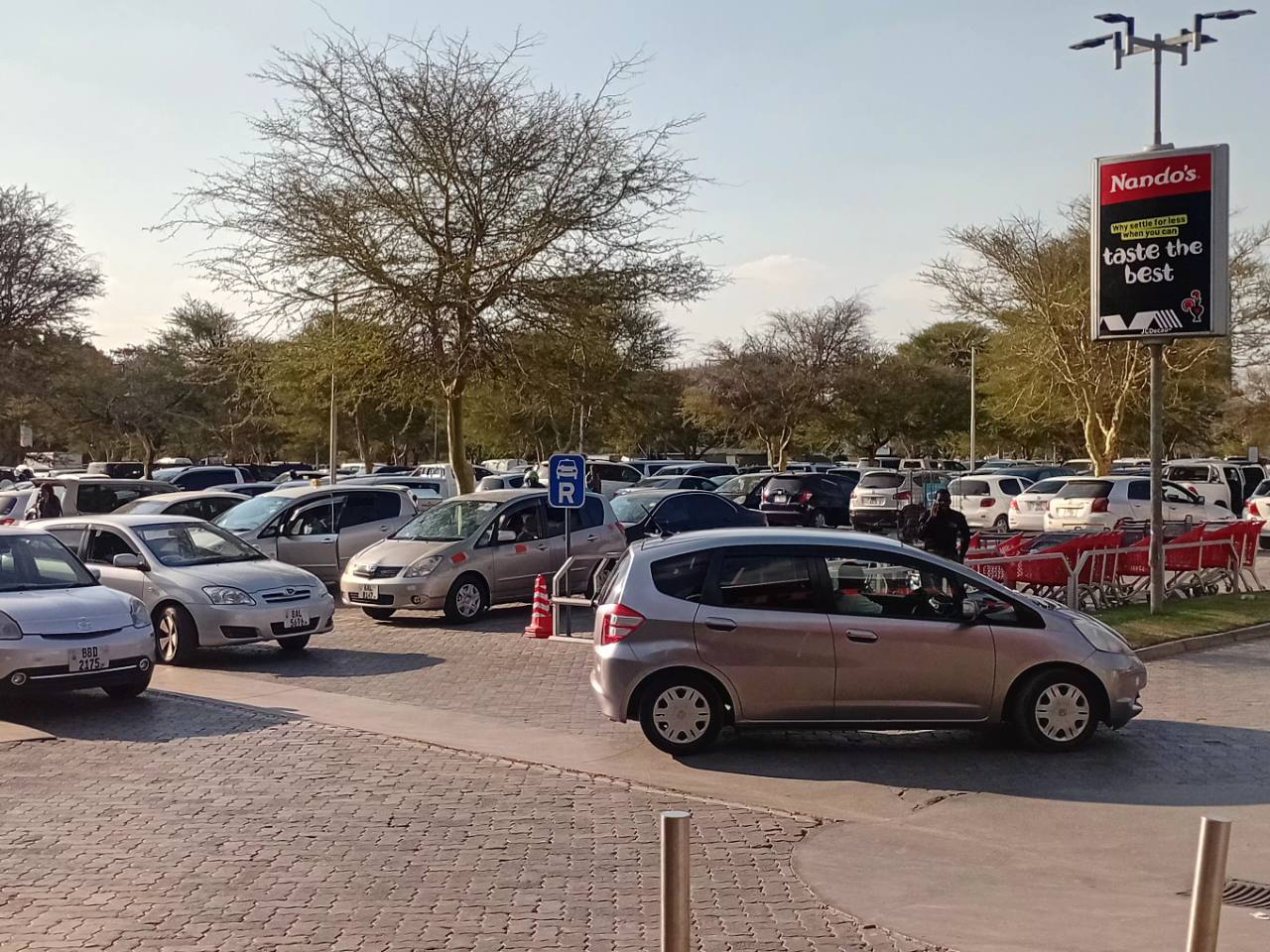 Rows of vehicles occupying the East Park Mall parking area on 2 August 2026
