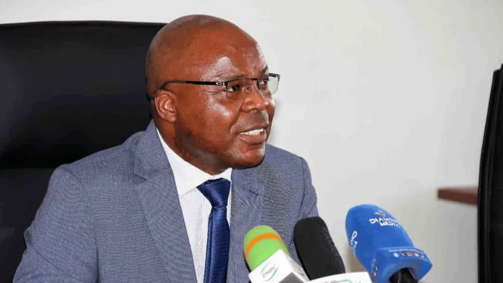 ECZ Chief Electoral Officer Brown Kasaro announcing extended voting hours for late-opening polling stations