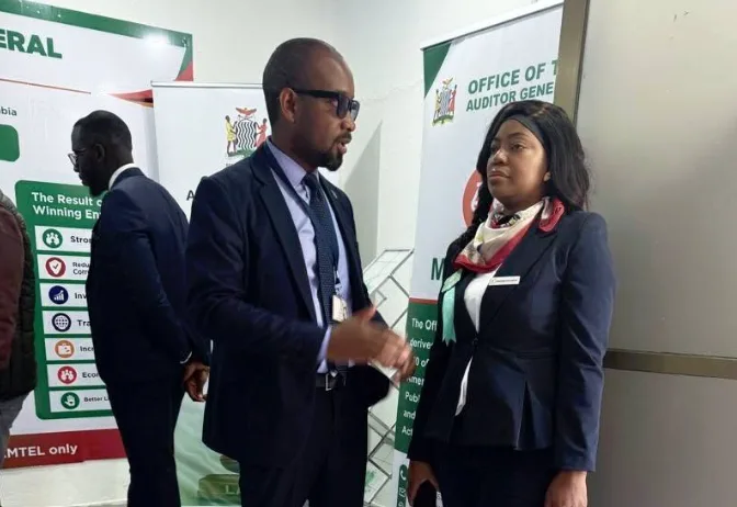 Emmanuel Chisalu, Principal Planner, engages visitors at the OAG Agricultural Show stand