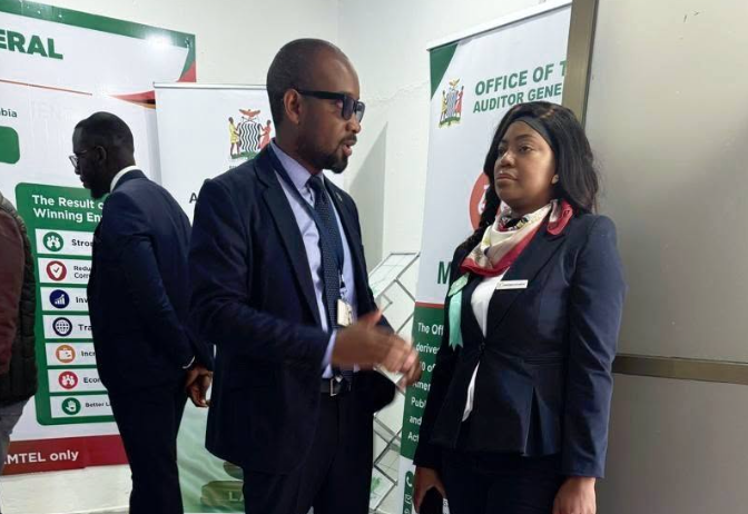 Emmanuel Chisalu, Principal Planner, engages visitors at the OAG Agricultural Show stand