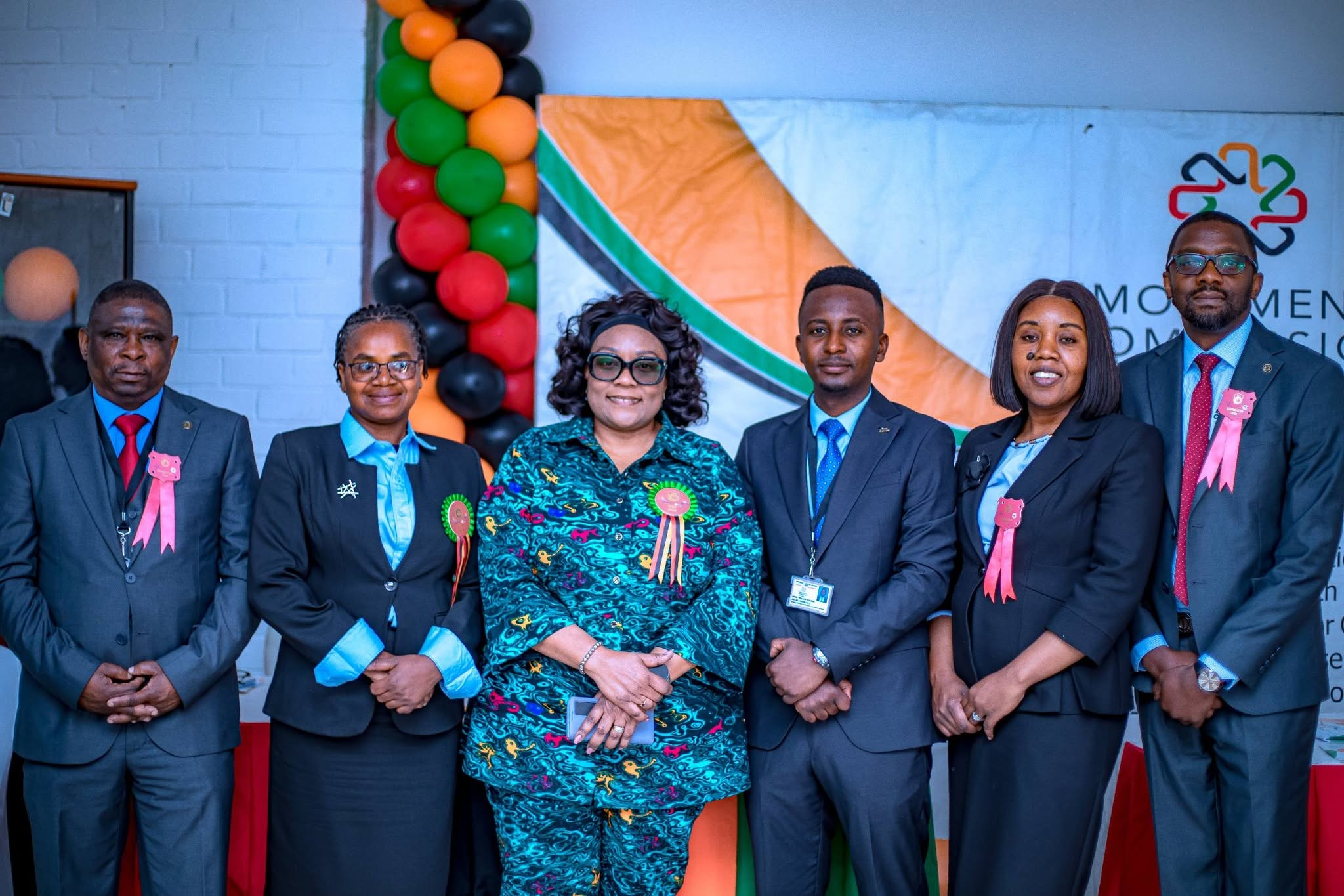 Louise Mulube with Emoluments Commission representatives at the 98th Agricultural and Commercial Show