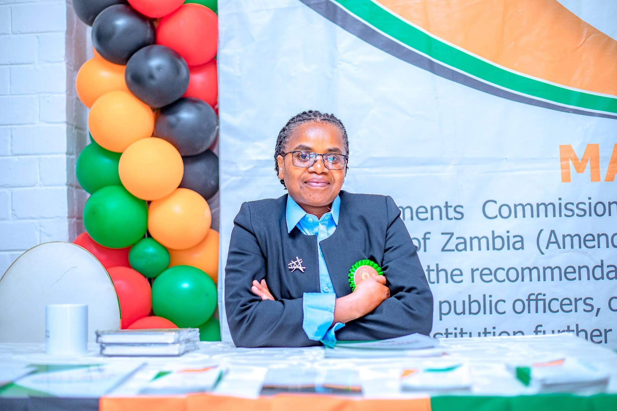 Emoluments Commission representative at the Agricultural and Commercial Show stand