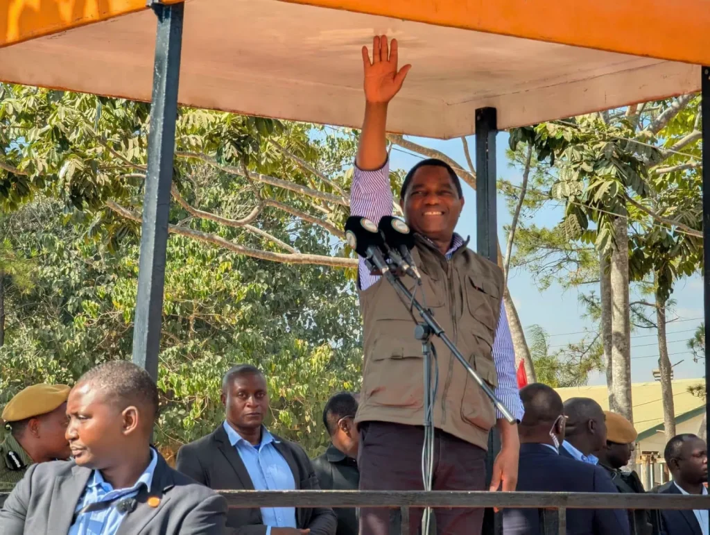 President Hakainde Hichilema waves from a public platform after Zambia’s 2026 general election