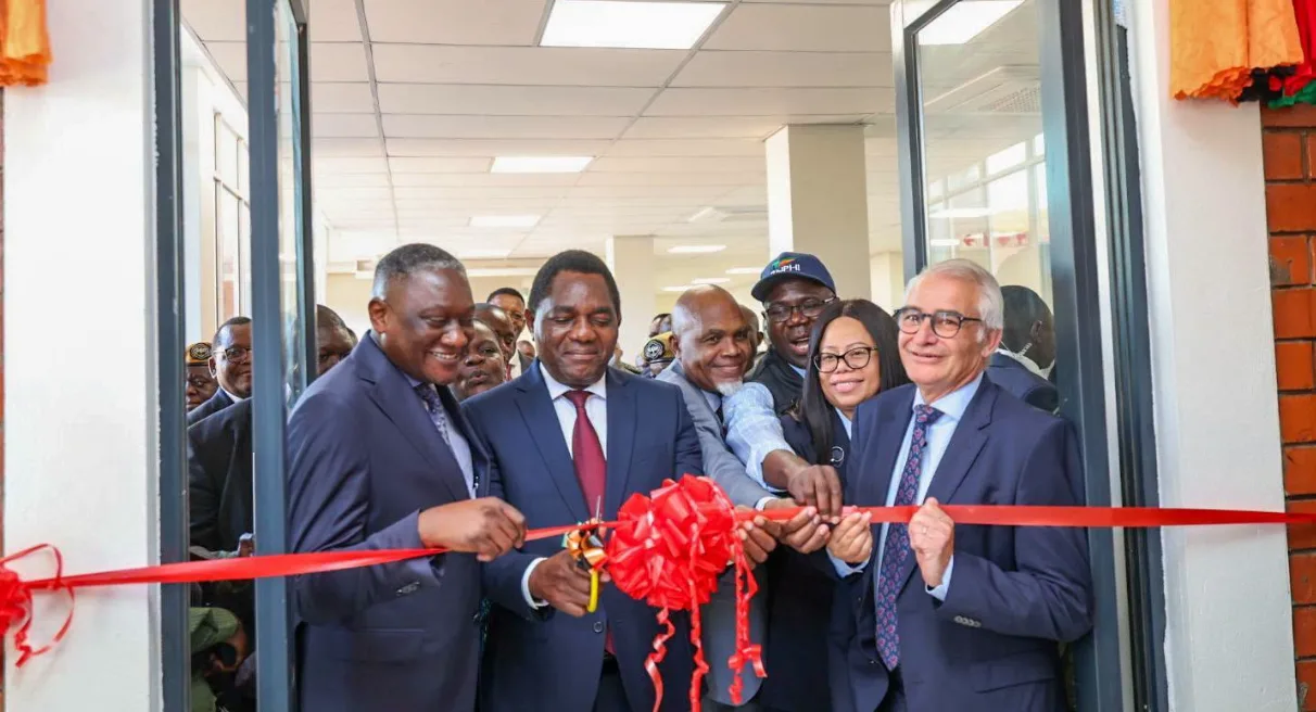 President Hakainde Hichilema cutting a ribbon to recommission the refurbished radiotherapy and imaging unit at the Cancer Diseases Hospital in Lusaka