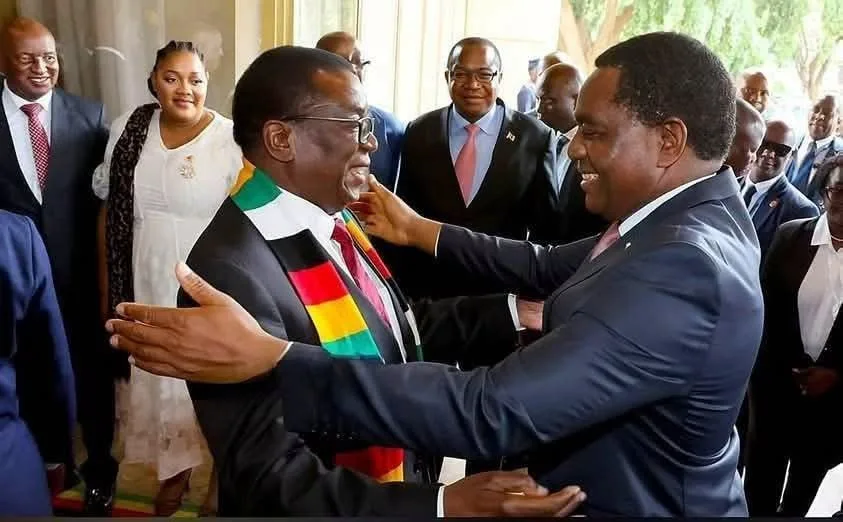 Zimbabwe President Emmerson Mnangagwa greeting Zambia President Hakainde Hichilema
