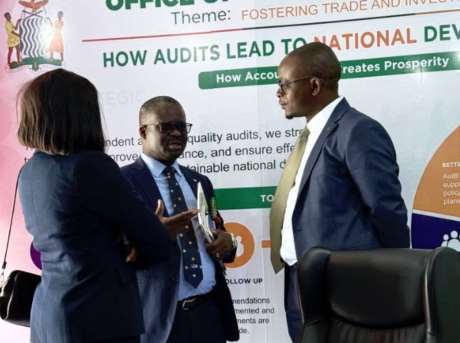 Mwika Mpoya, Senior Planner, participates in public engagement at the OAG stand