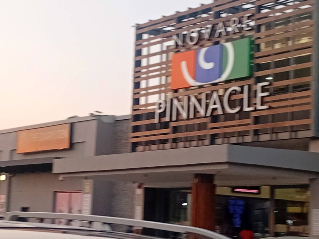 Novare Pinnacle Mall exterior sign at the Woodlands shopping centre in Lusaka