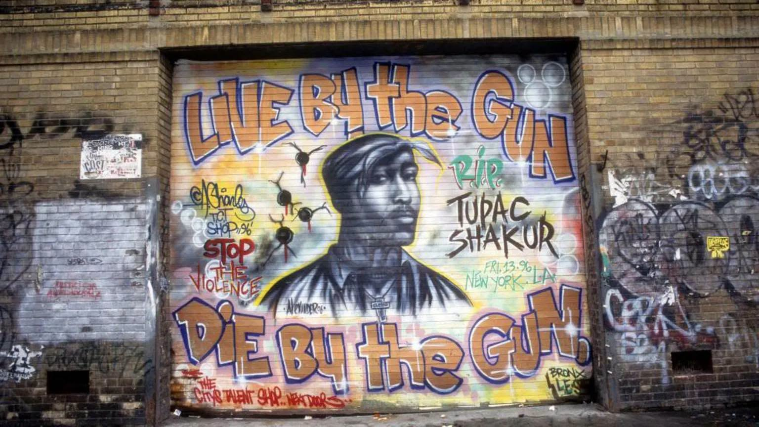 A Tupac Shakur mural painted on a building in New York.