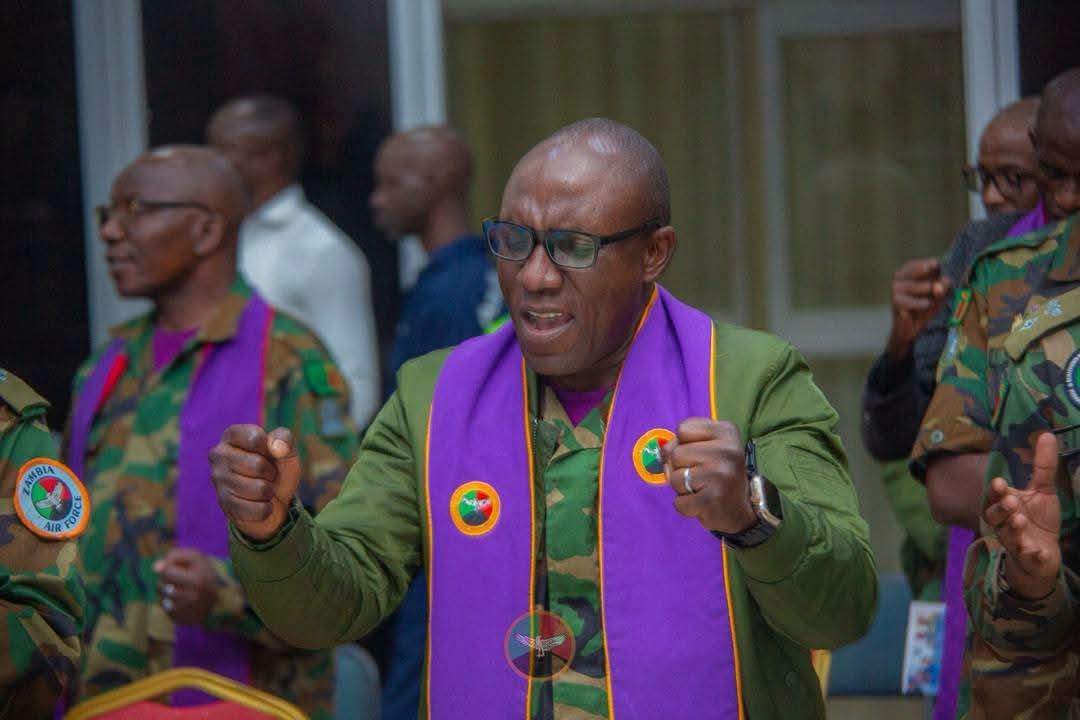 Zambia Air Force chaplain leads prayers during the election peace service