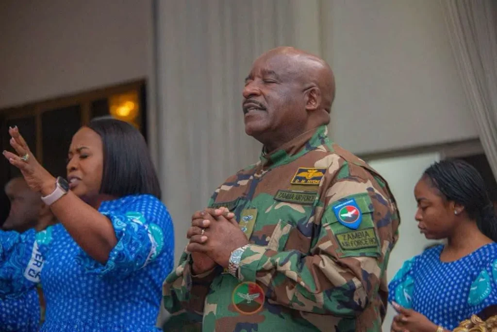 Lieutenant General Oscar Nyoni prays at the Zambia Air Force intercessory service in Lusaka