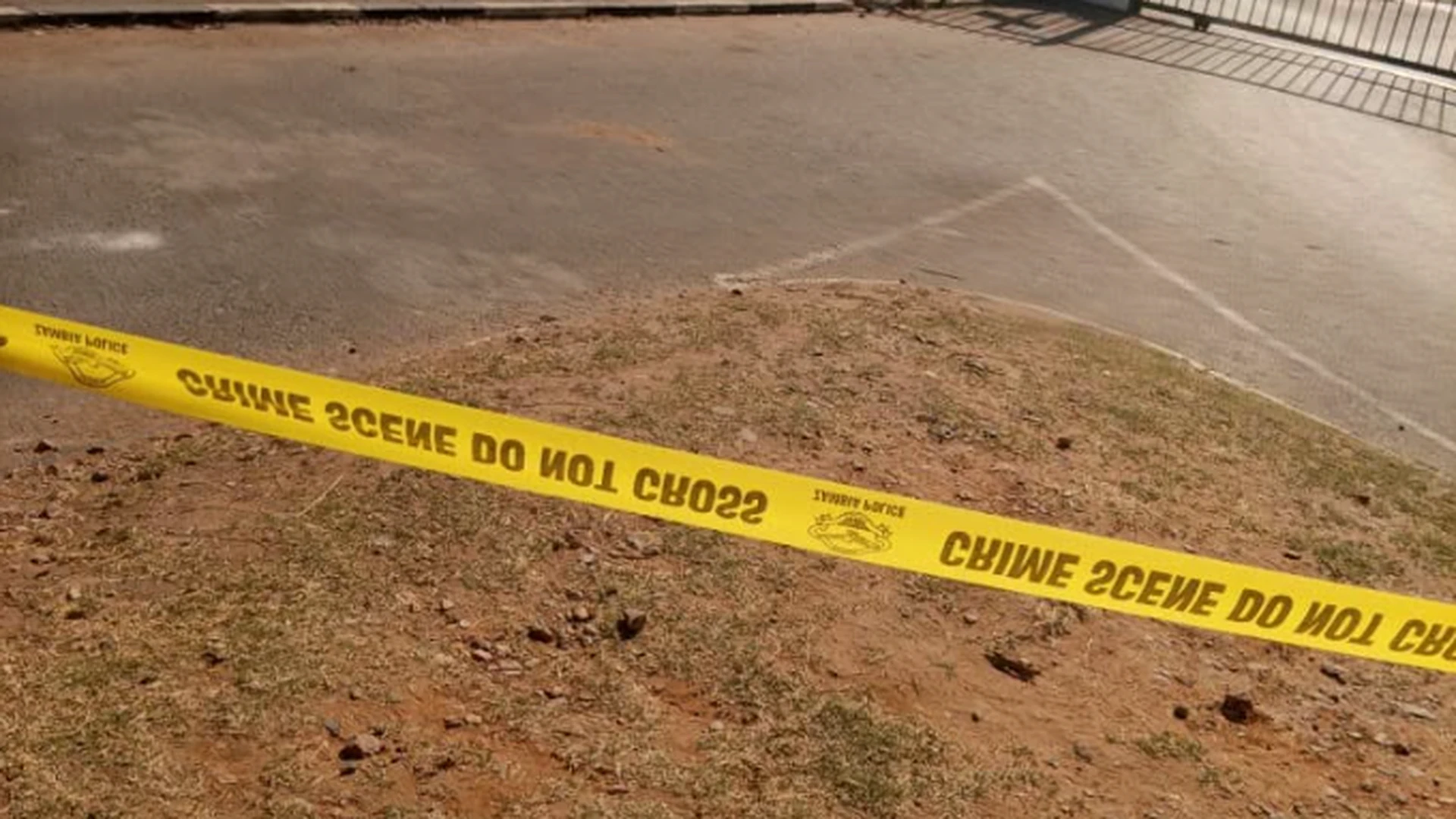 Zambia Police crime-scene tape restricts access near closed court premises