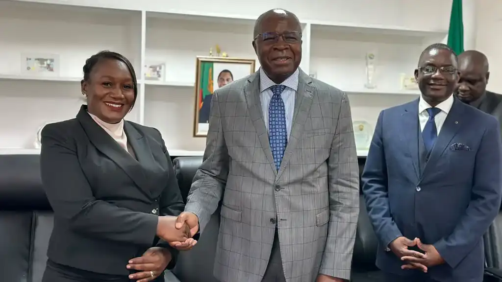 EAZ President Dr Edna Kabala-Litana shakes hands with Finance and National Planning Minister Dr Situmbeko Musokotwane during the Association's courtesy call in Lusaka
