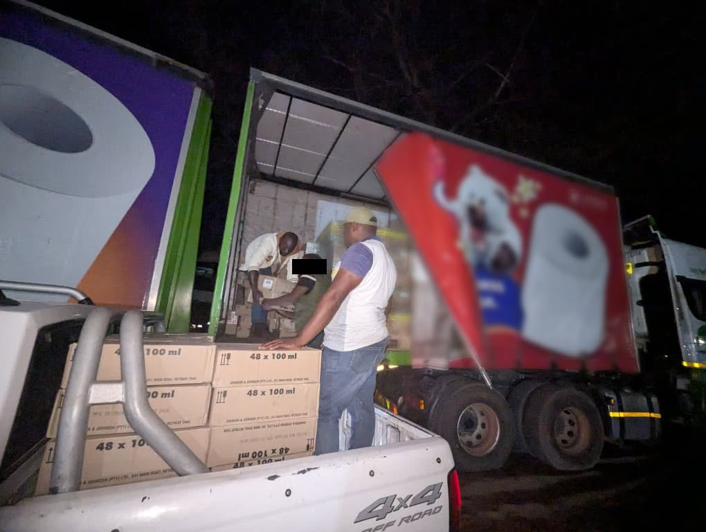 Boxes beside an open truck at night in the image accompanying DEC’s statement about the reported codeine seizure.