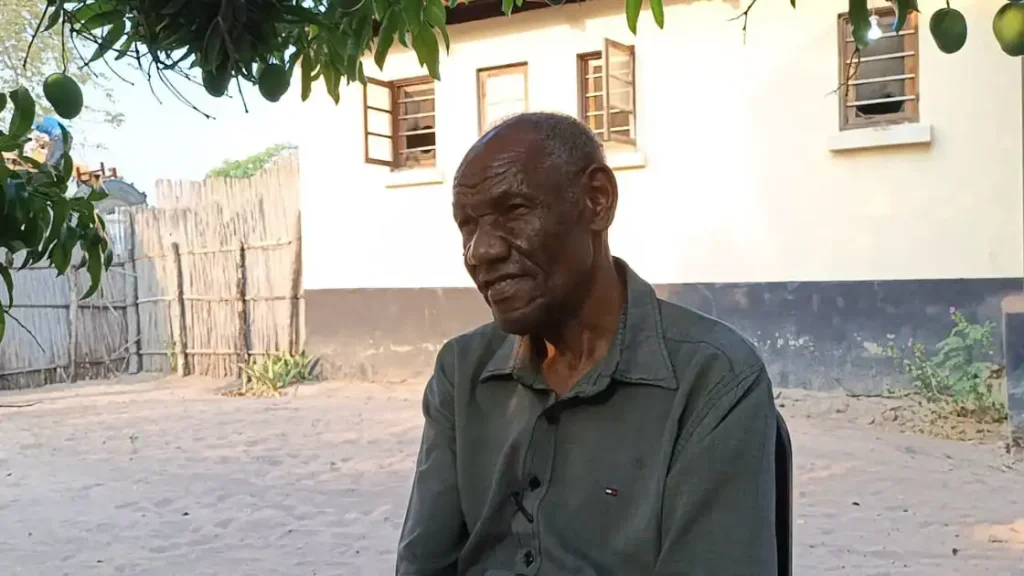 Former Barotse Royal Establishment Ngambela Mukela Manyando seated outdoors in Western Province, Zambia