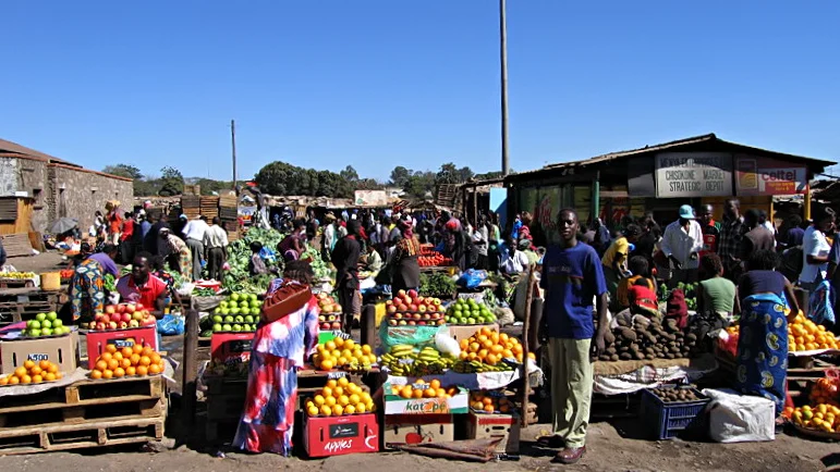 Fruit and vegetable stalls at Chisokone Market in Kitwe, Zambia
