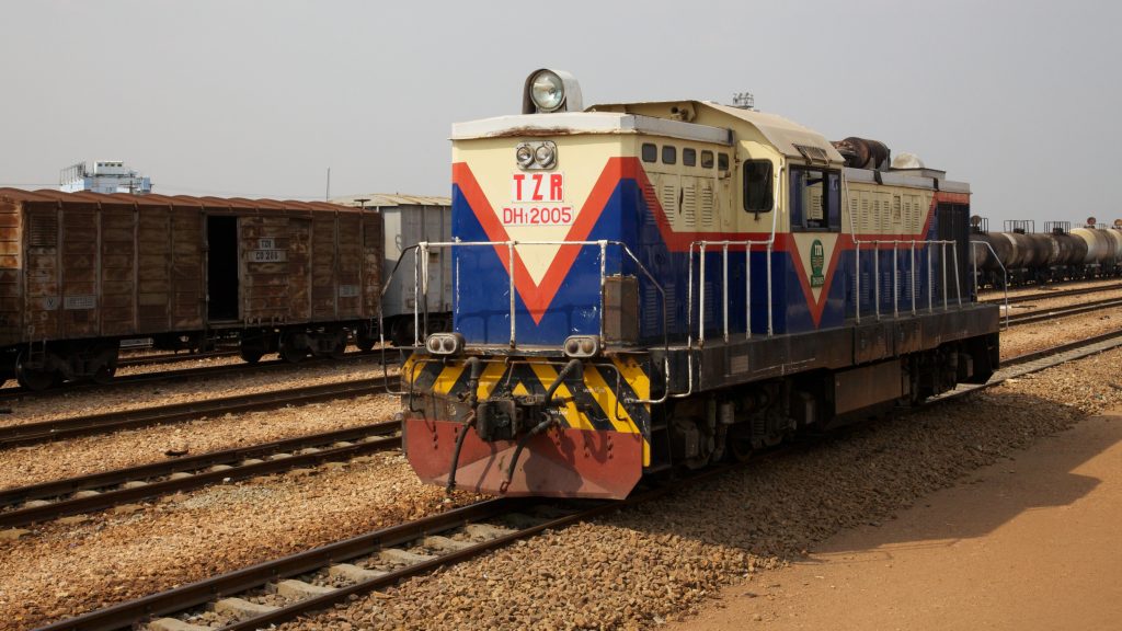 Blue and white TAZARA locomotive at New Kapiri Mposhi station in Zambia, photographed in October 2012.