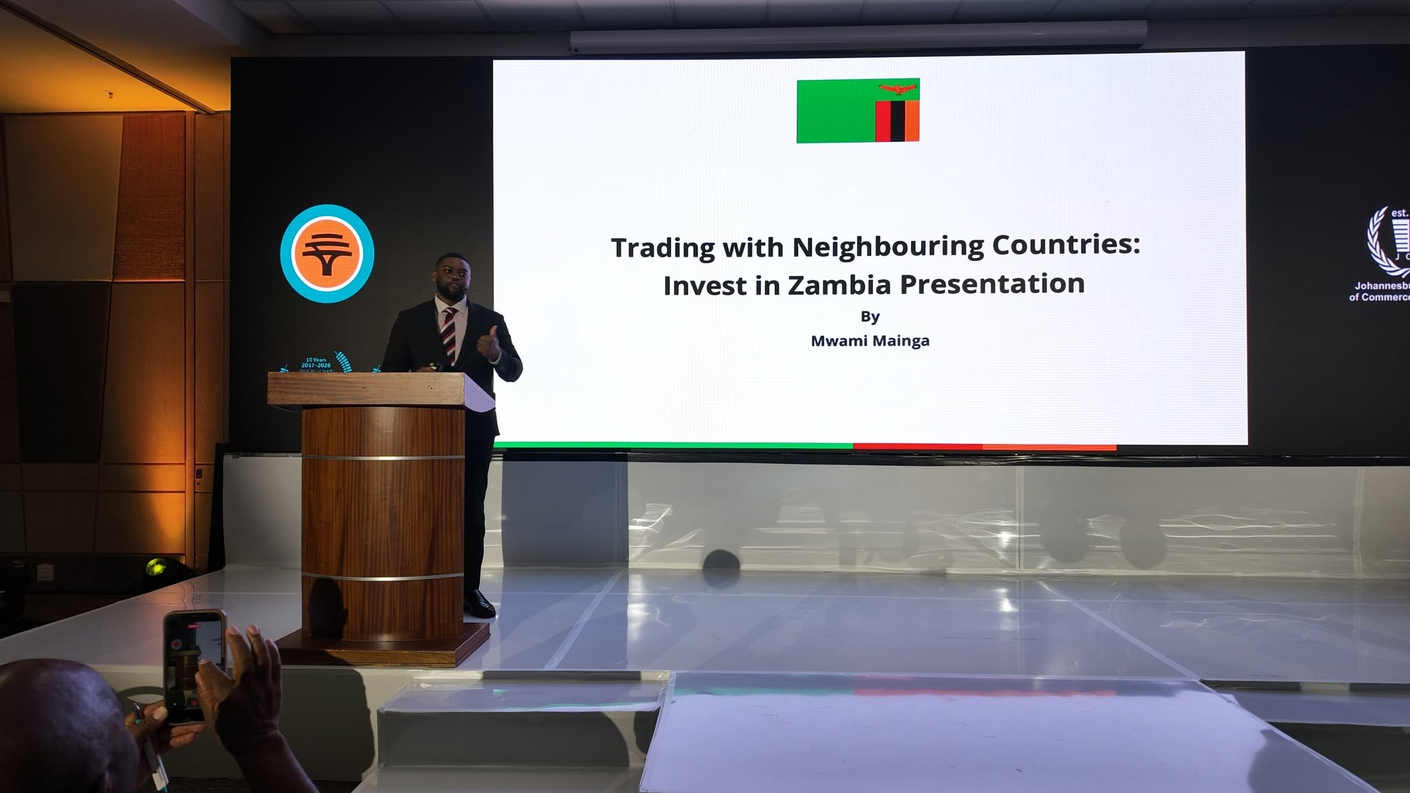 Mwami Mainga delivering the Invest in Zambia presentation at the JCCI forum in Johannesburg.